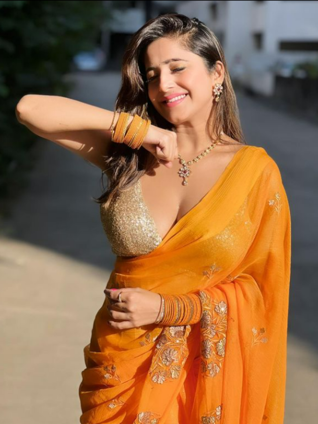 Kate Sharma wearing an orange sari
