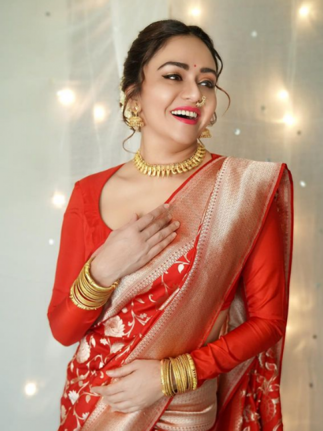 Amruta Khanvilkar in different sari outfits during her acting career